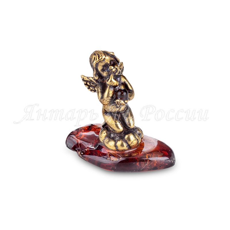 Ангел сидит на коленках Латунь, янтарь Ангел сидит на коленках Латунь, янтарь